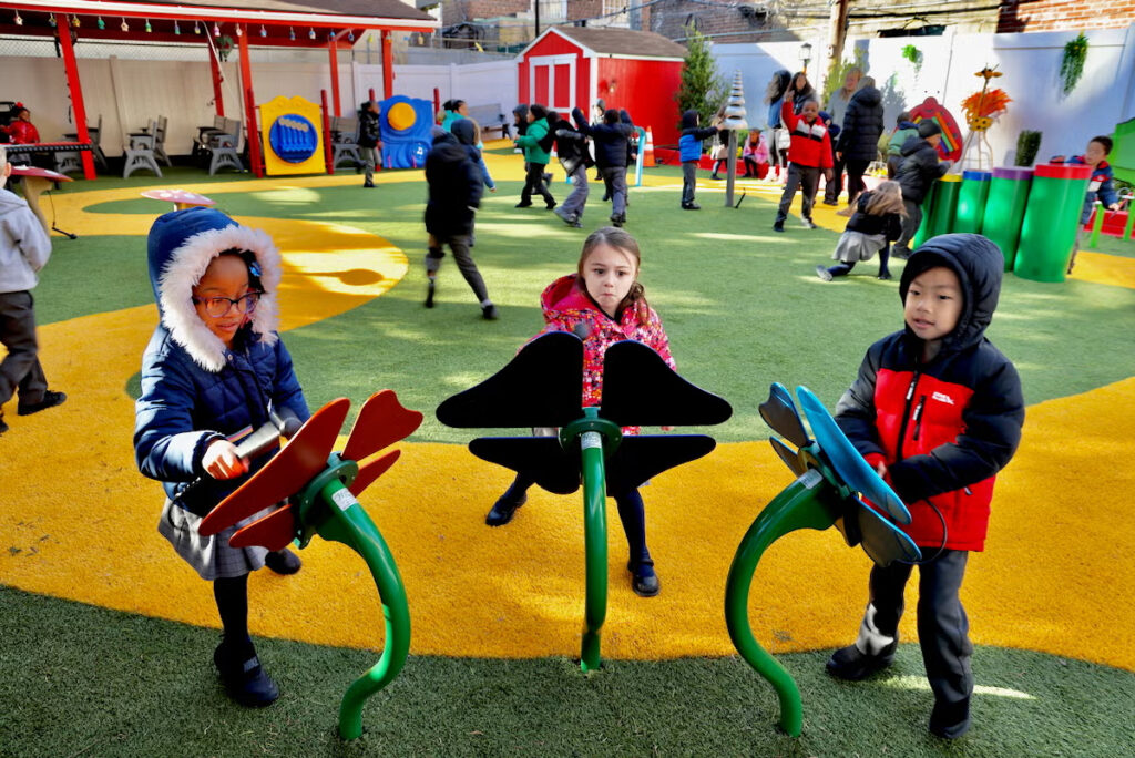 2025-11-14-e-lee-philadelphia-performing-arts-charter-school-sensory-garden-musical-flowers-file Kindergarten students playing