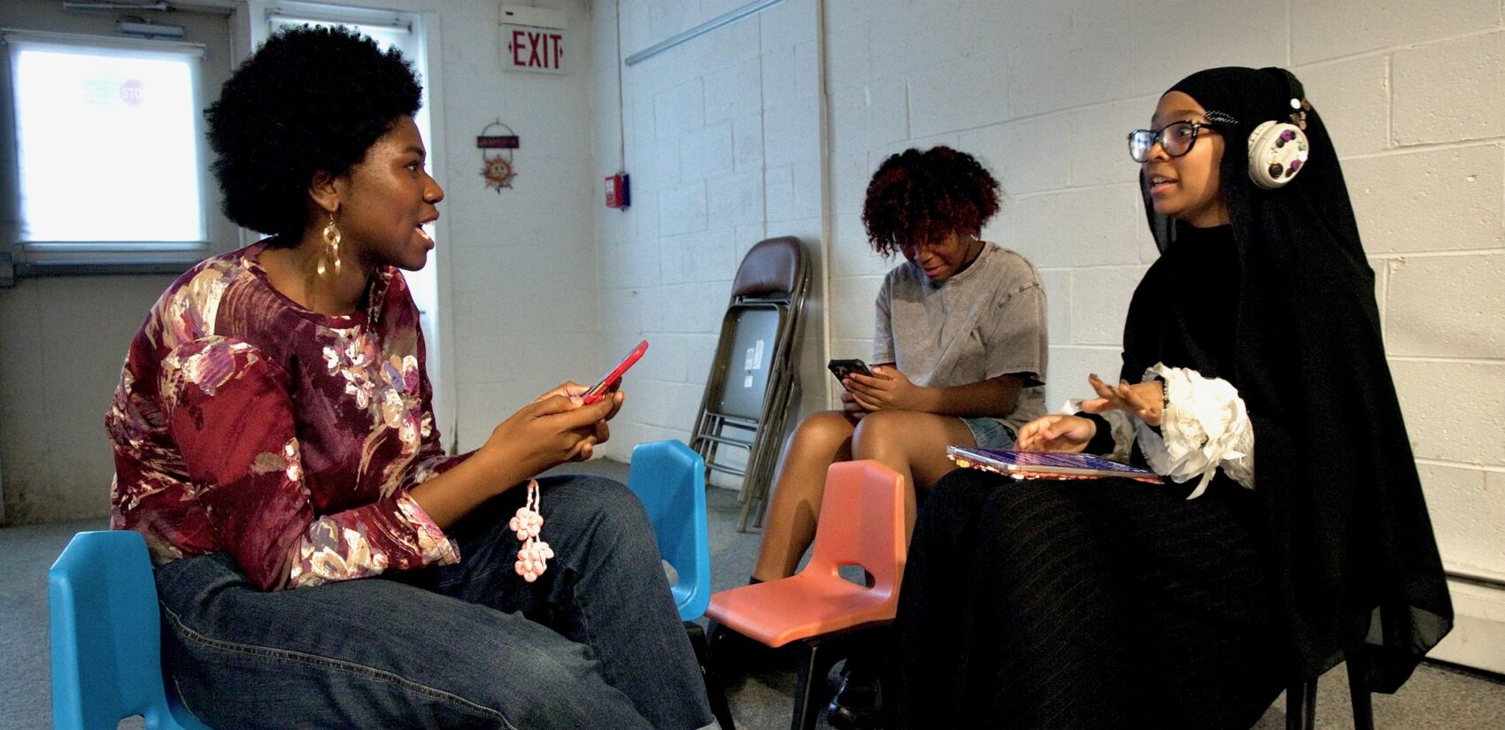 Zion Nalah Petty (left) works with other members of Shadow Company