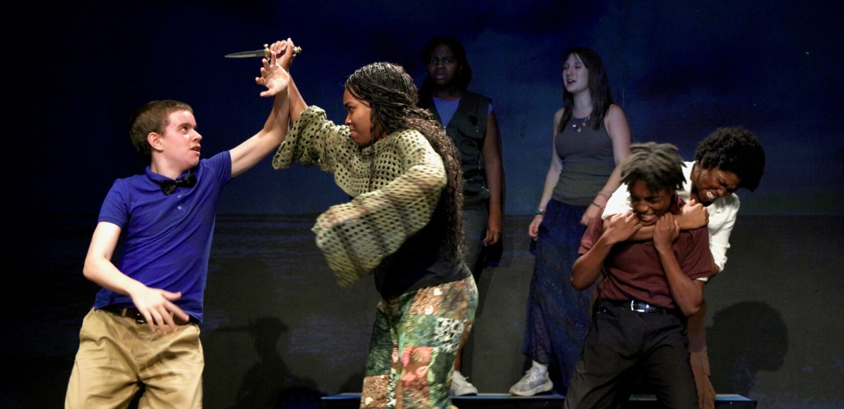 Chedani Pressley wields a knife during a fight scene