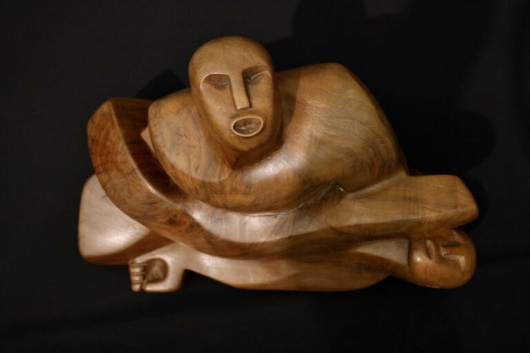 Wooden sculpture on display at art show
