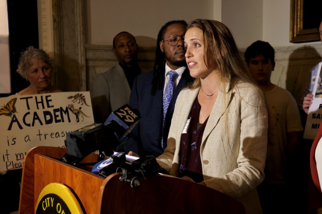 Ileana Betancourt of the Save the Academy Coalition speaks during a rally