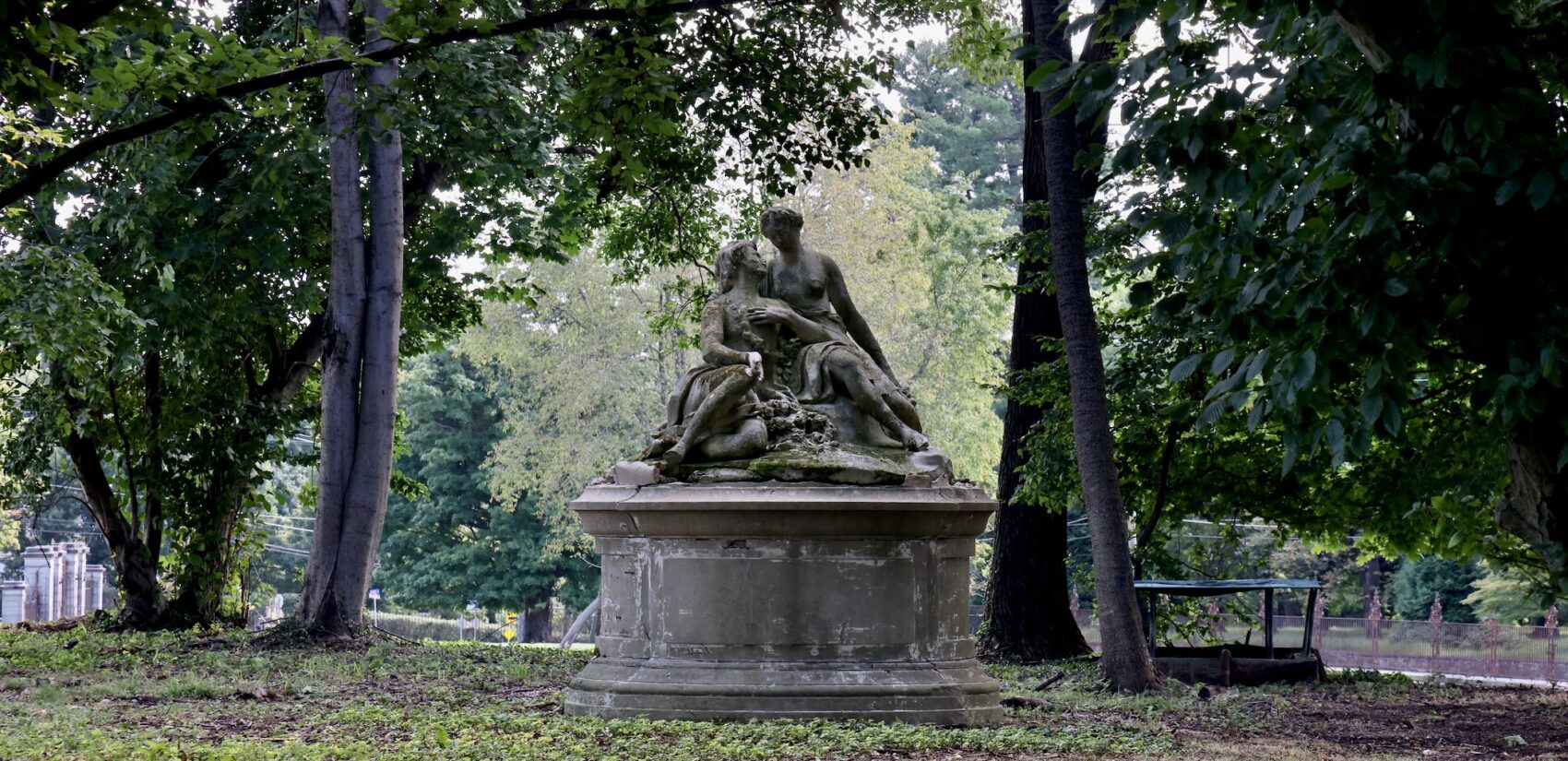 a sculpture in a garden