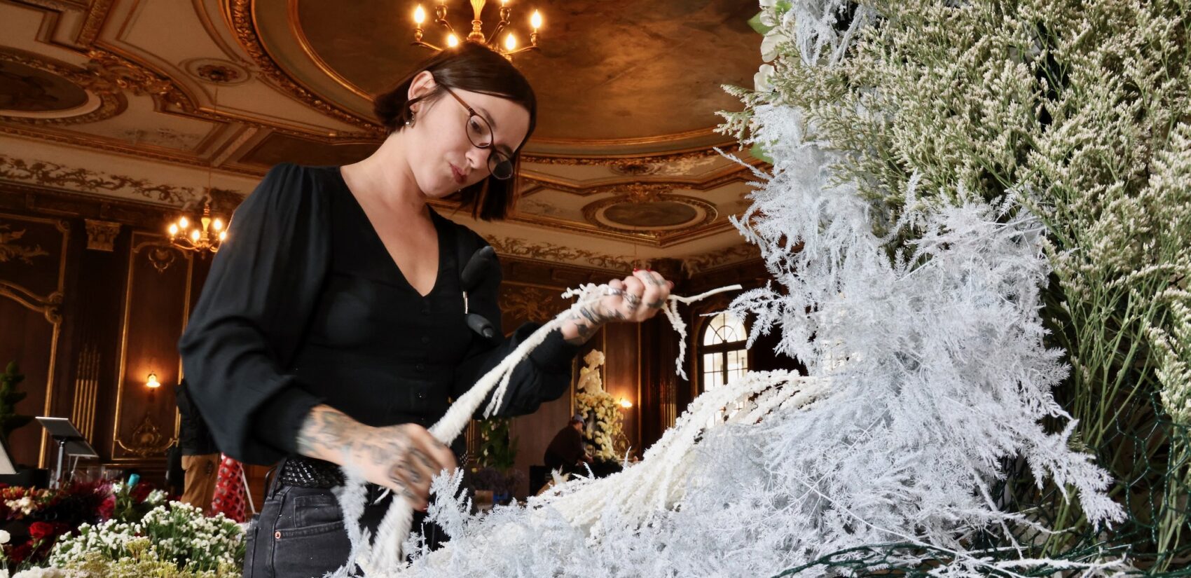 Philadelphia florist Hannah Spivak adds floral elements to an artwork