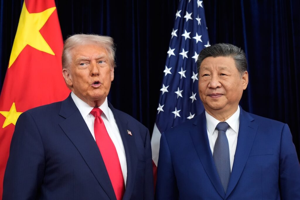 South Korea China Trump Asia President Donald Trump, left, and Chinese President Xi Jinping pose together ahead of their summit talk at Gimhae International Airport in Busan, South Korea, Thursday, Oct. 30, 2025. (AP Photo/Mark Schiefelbein)