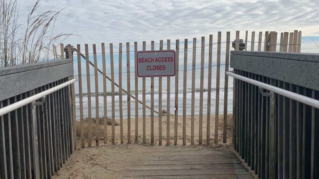 bethany-beach-erosion-2026-09-noreaster-sg-2-cropped a sign at Bethany Beach reads BEACH ACCESS CLOSED