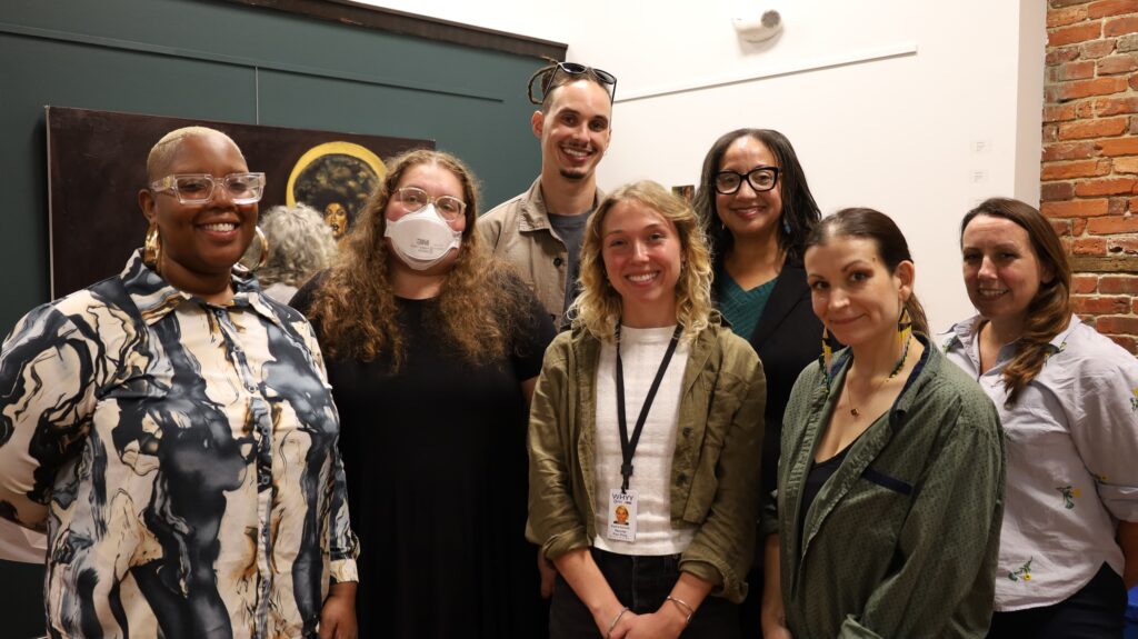 Staff from WHYY and The Margin smile for a picture