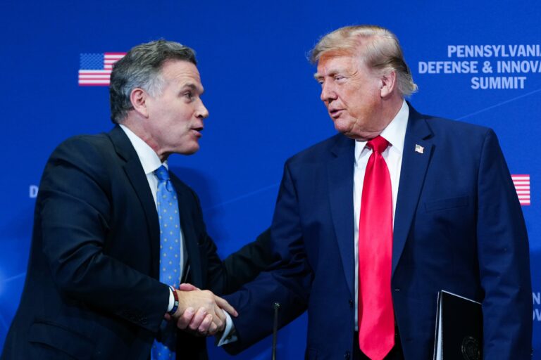 Dave McCormick shakes Donald Trump's hand