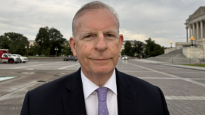 Republican Joe Arminio poses for a photo