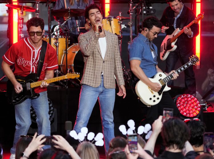 The Jonas Brothers performing