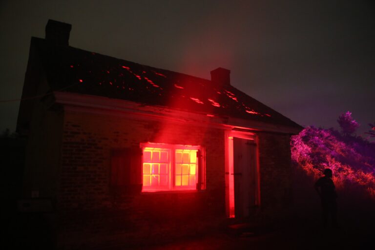 a house with a red glow