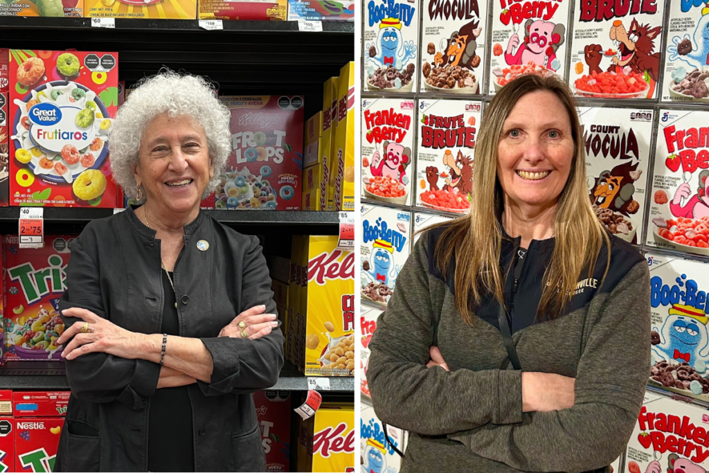 marion-nestle-lisa-sutherland-sugar-coated-authors (1) Marion Nestle and Lisa Sutherland stand in front of dozens of cereal boxes, stacked in a grocery aisle.