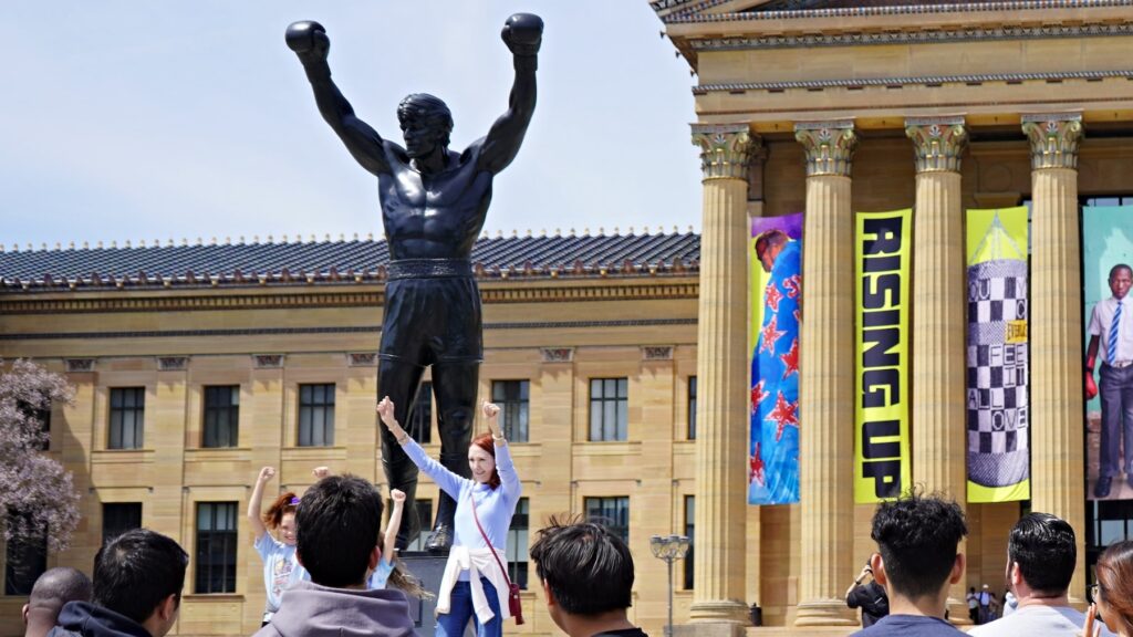 rocky-statue-bp-090926 Tourists line up for photos in front of the second Rocky statue