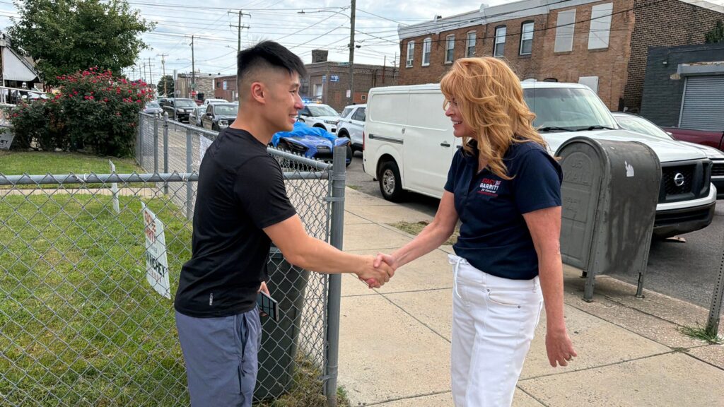 stacy-garrity-philadelphia-2026-09-12-cr-1 Stacy Garrity greets Ray Tran with a handshake