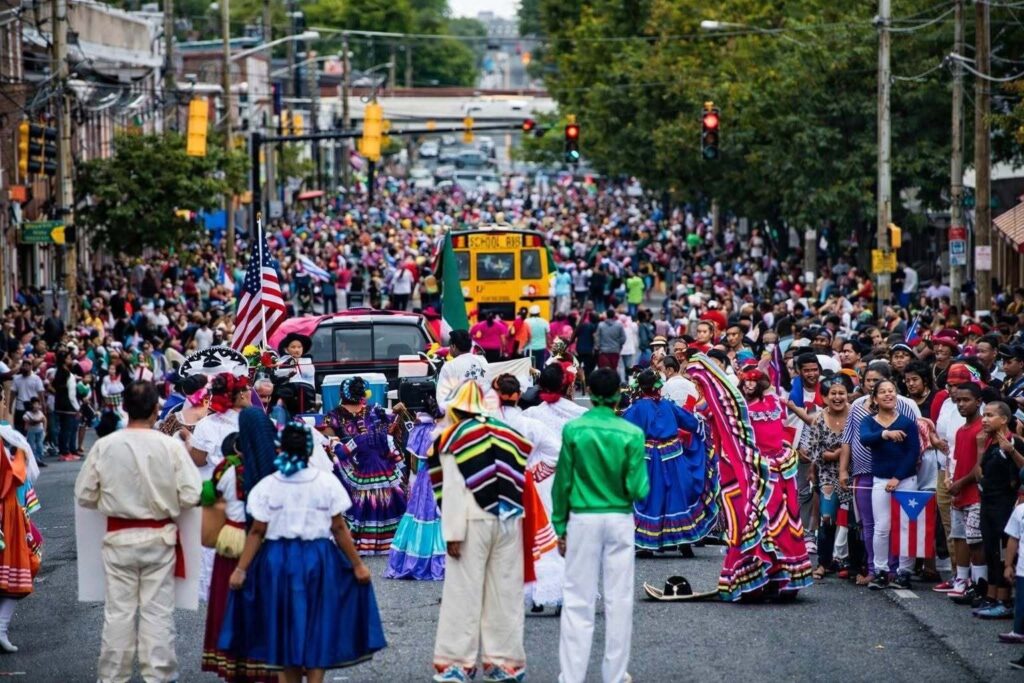 wilmington-parade-2026-09-02-2 A massive crowd of people fill the street.