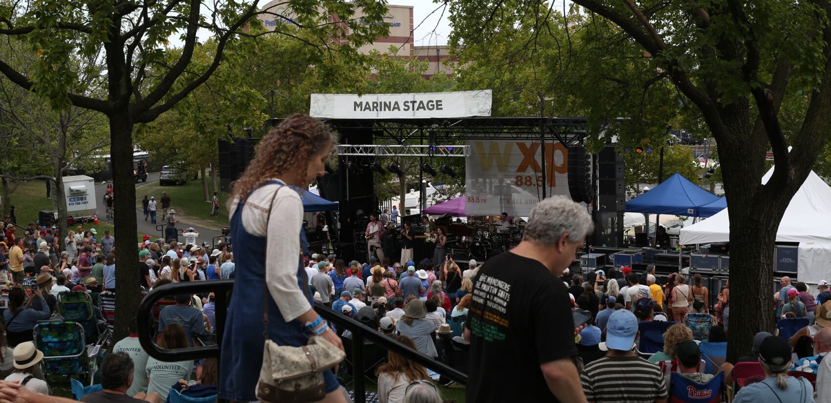 the crowd watches a show at the Marina Stage