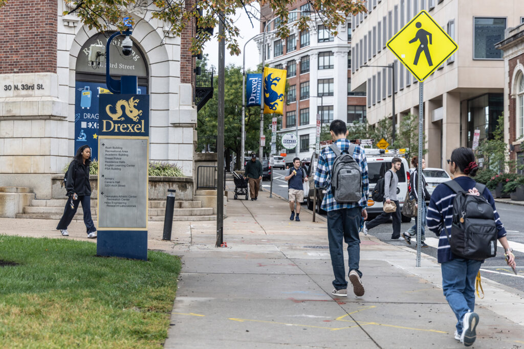 Students walk on Drexel University's campus
