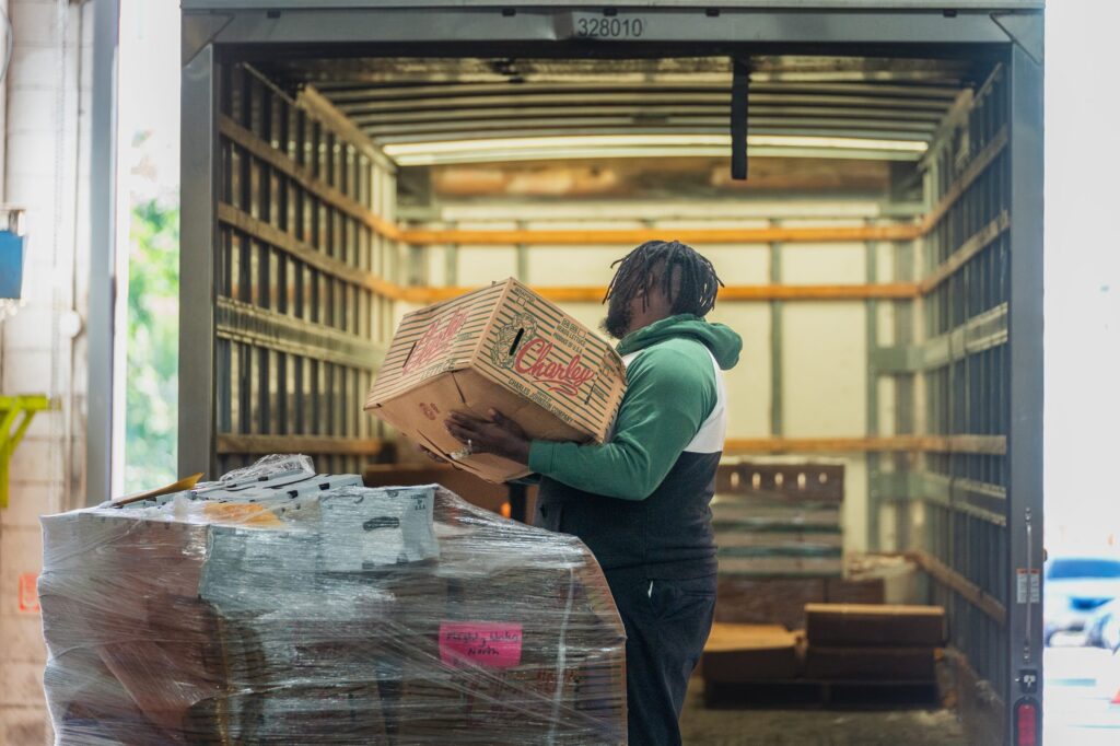 2023-10Oct-17-Share-Food-Bank-GRID174-0005-1-scaled Staff for the Share Food Program may have to drive further to source food now