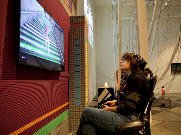 Corrina Mullins playing a video game
