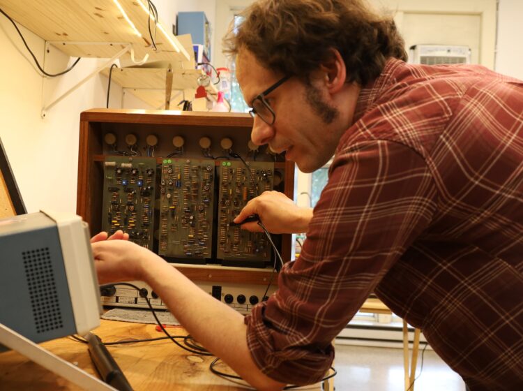 Darian Scatton testing out synth frequencies