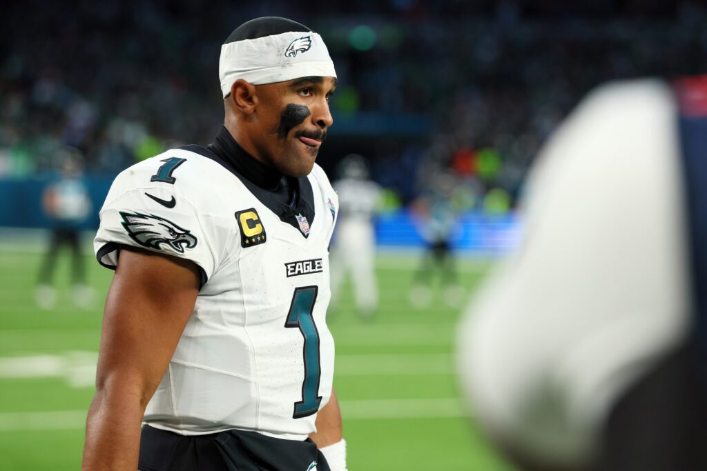 Philadelphia Eagles quarterback Jalen Hurts watches from the sideline during the second half of an NFL football game against the Jacksonville Jaguars in London, Sunday, Oct. 11, 2026. (AP Photo/Adam Bettcher)