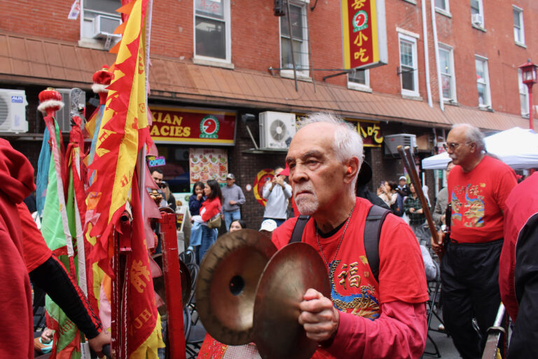 Members of Cheung’s Hung Gar Kung Fu martial arts school performe the lion dance