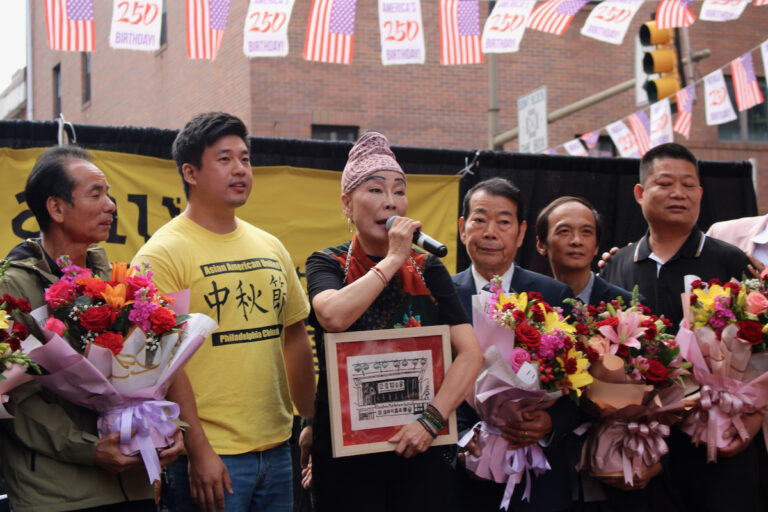 Mabel Chan, center, receives a Legacy Award at the 31st annual Mid-Autumn Festival