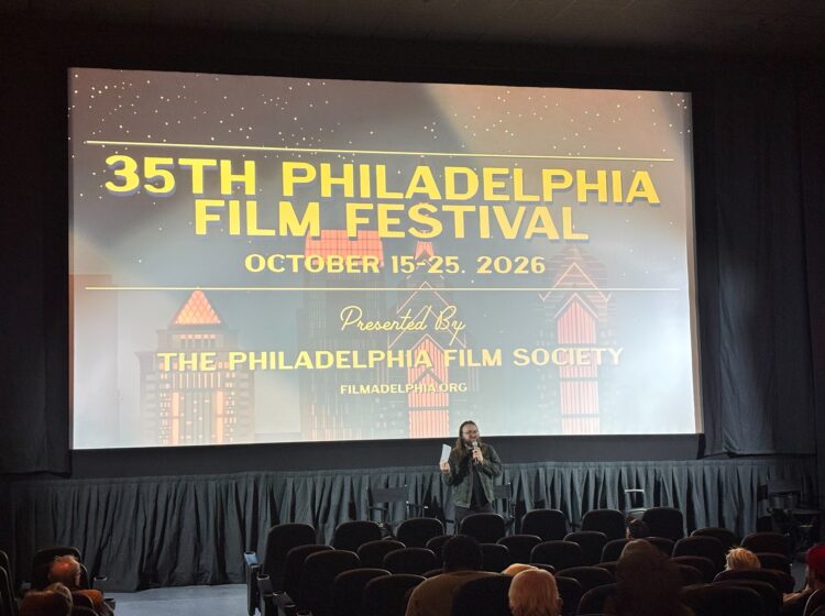 Trey Shields in front of a movie screen