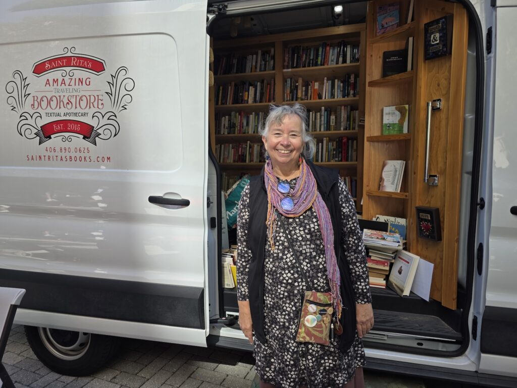 rita-collins-bookstore-van-es-101626 Rita Collins of Baltimore brings her bookstore van